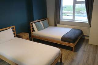 Хостелы Rougey Lodge Hostel Бандоран Двухместный номер с 2 отдельными кроватями-2